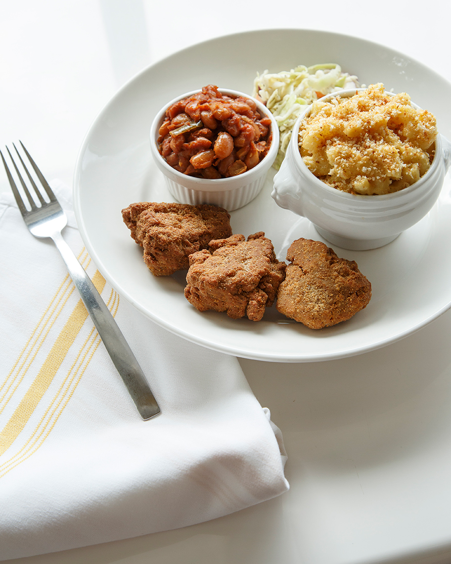 commercial food photographer - The Southern Plate vegan main dish: Southern seitan, mac and Cheese, baked beans, and coleslaw 