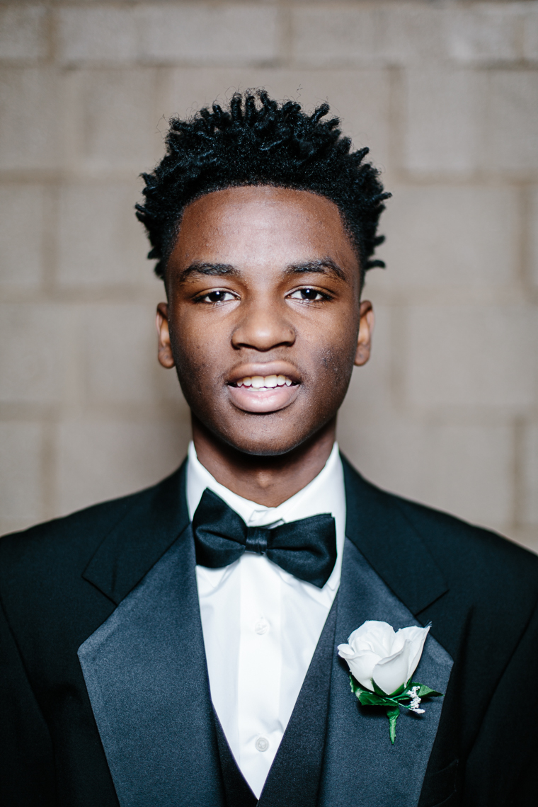 Harvey Agee, 16, proudly wears his tuxedo at the 500 Black Tuxedos Event, organized by Andre Lee Ellis on Saturday December 12th, 2015 in Milwaukee, Wisconsin.