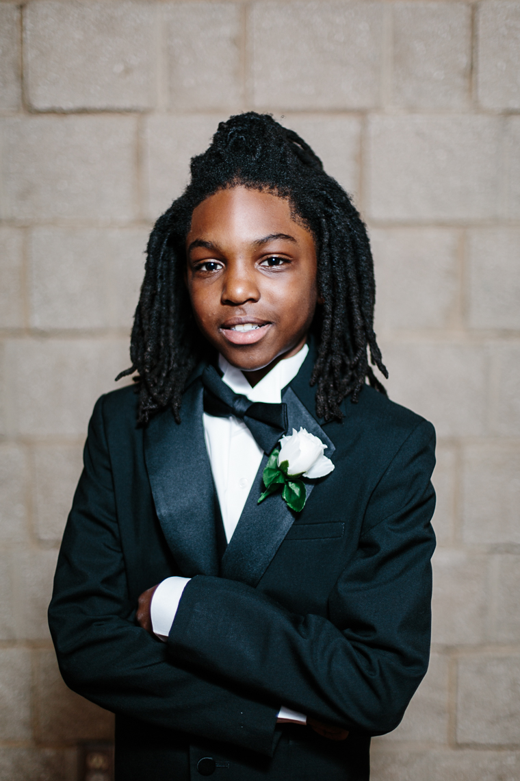 Jimmie Evans, 11, wears his tuxedo proudly at the 500 Black Tuxedos Event, organized by Andre Lee Ellis on Saturday December 12th, 2015 in Milwaukee, Wisconsin.