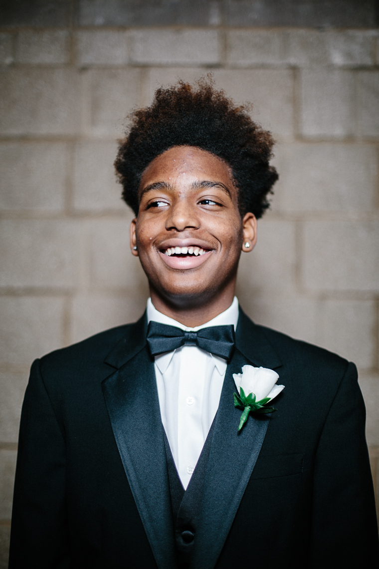 Treshon Lewis, 14, proudly wears his tuxedo at the 500 Black Tuxedos Event , organized by Andre Lee Ellis on Saturday December 12th, 2015 in Milwaukee, Wisconsin.
