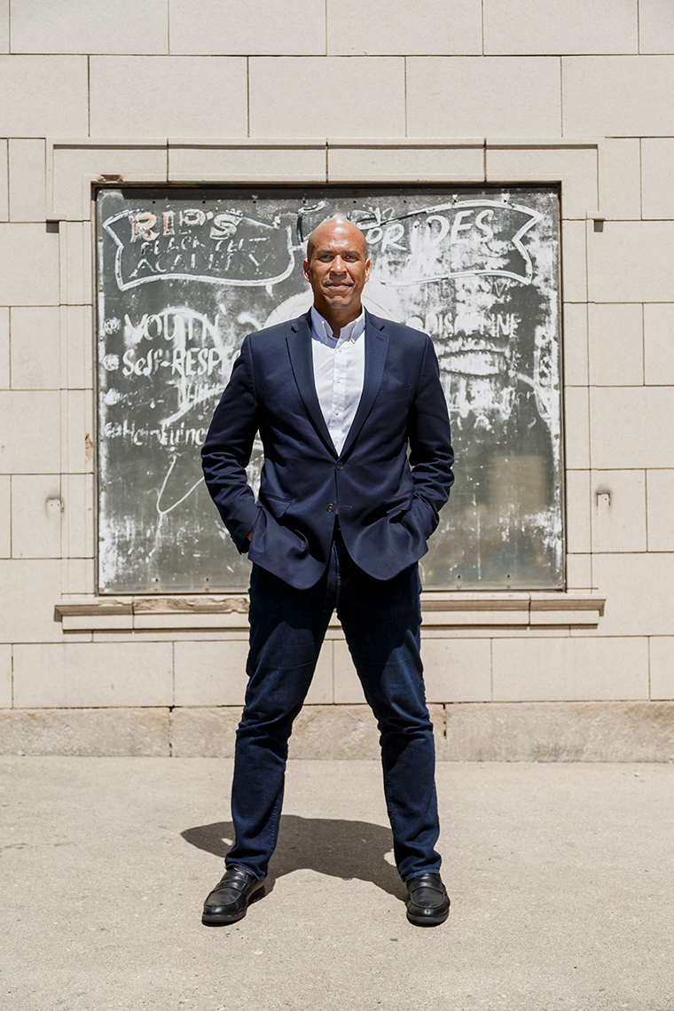editorial photographer - Cory Booker, New Jersey Senator standing for a full length portrait