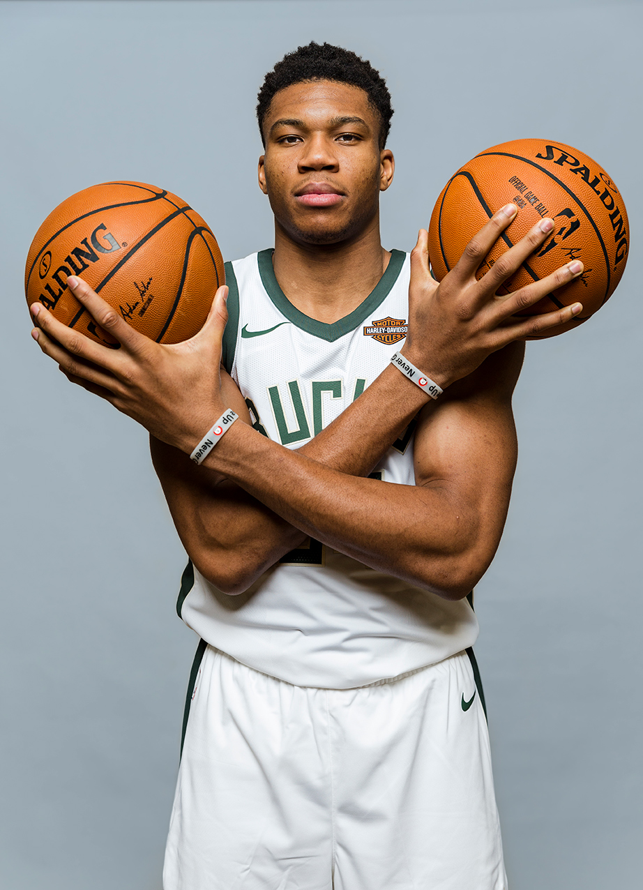 Sara Stathas, editorial sports photographer - portrait of Giannis Antetokounmpo of the Milwaukee Bucks holding a basketball