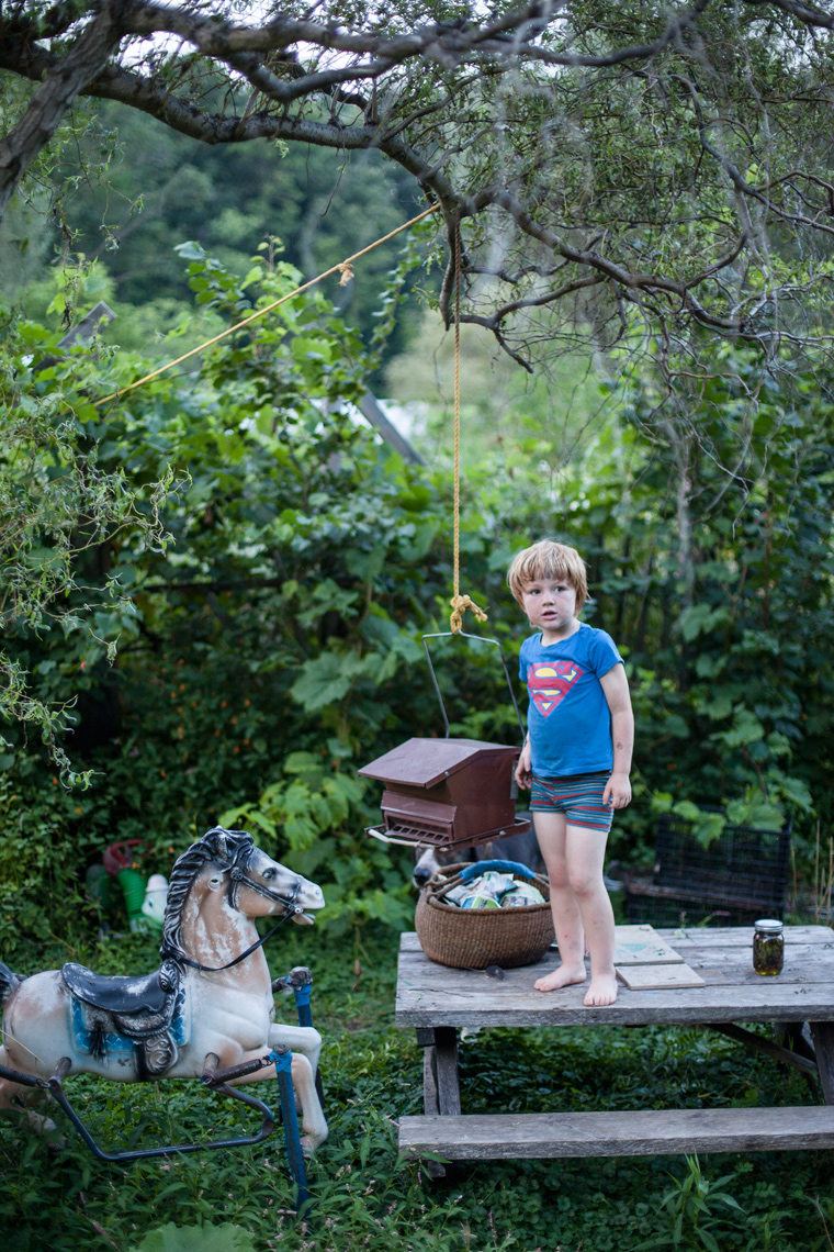 Sara Stathas portrait photographer - a young boy on his farm