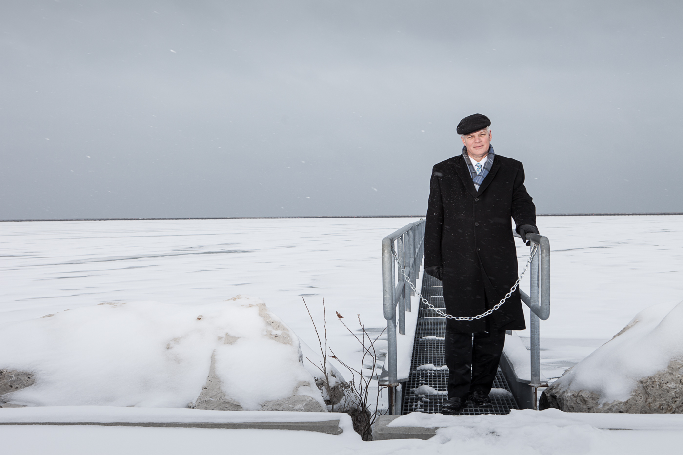 editorial photographer Milwaukee - Rich Meeusen portrait in winter on Lake Michigan 
