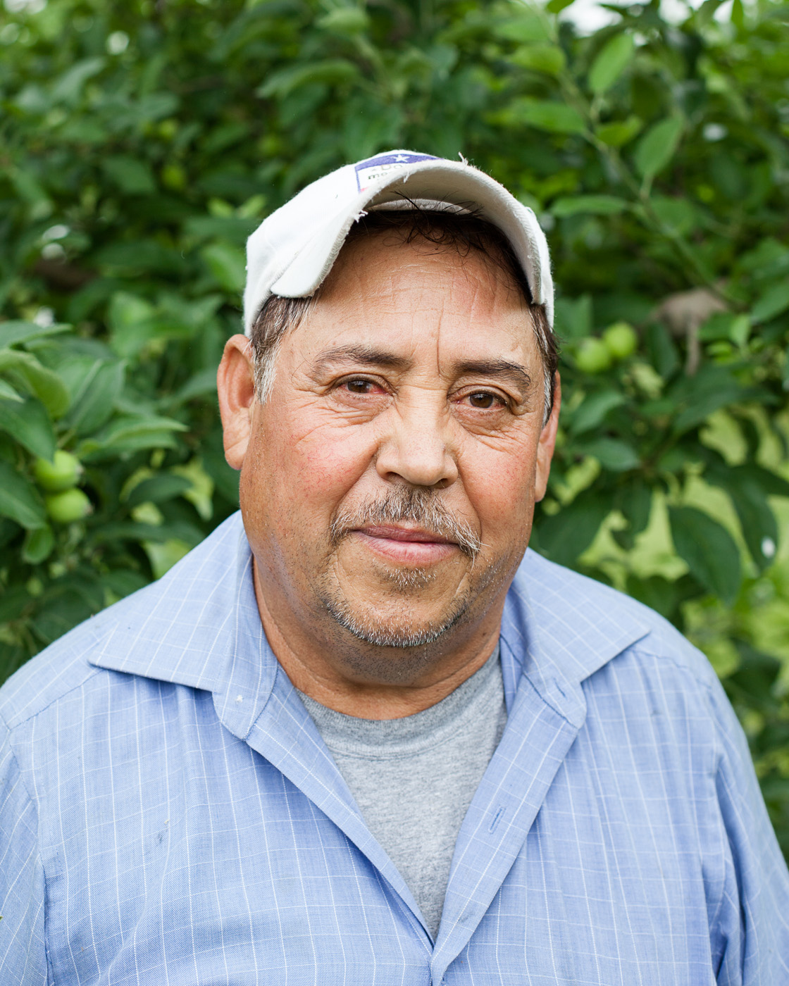 agriculture photographer Midwest - portrait of a worker in an orchard