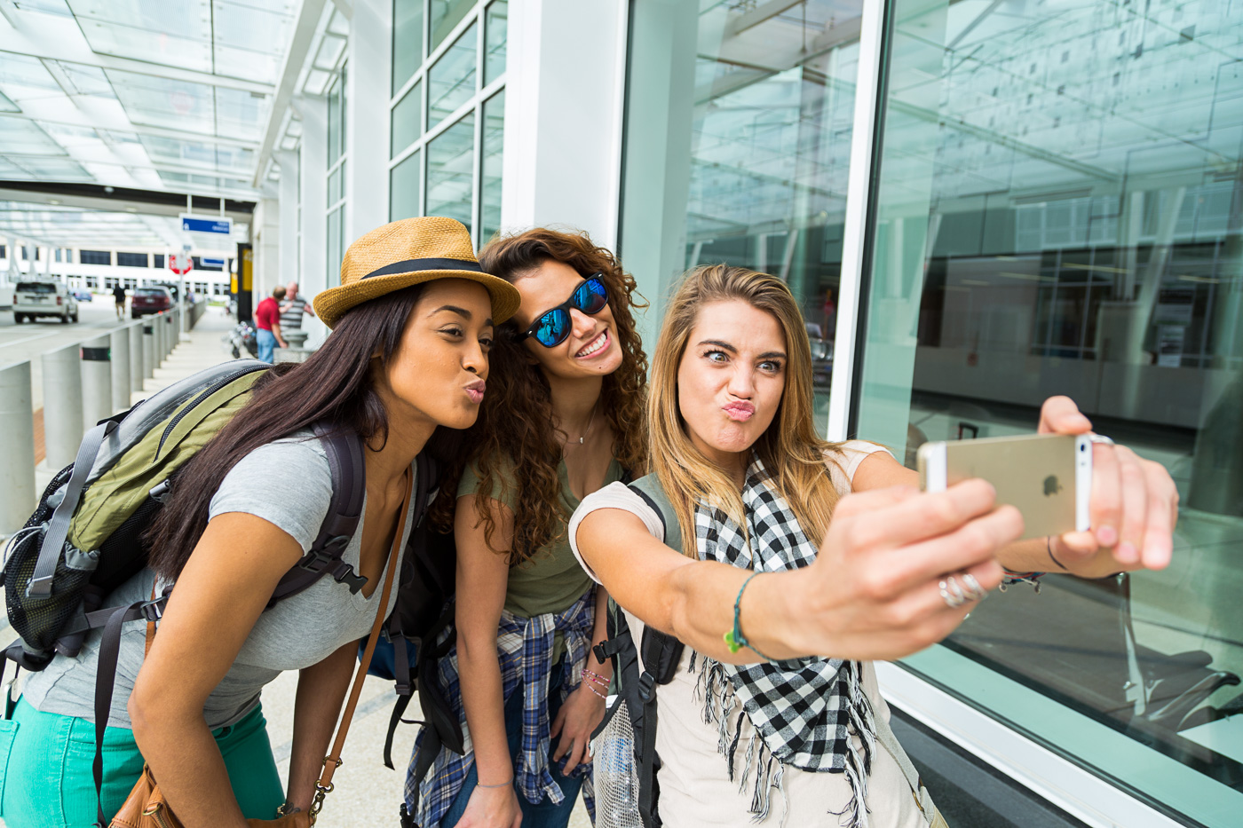 commercial photographer Wisconsin - three young women pose for a phone selfie 